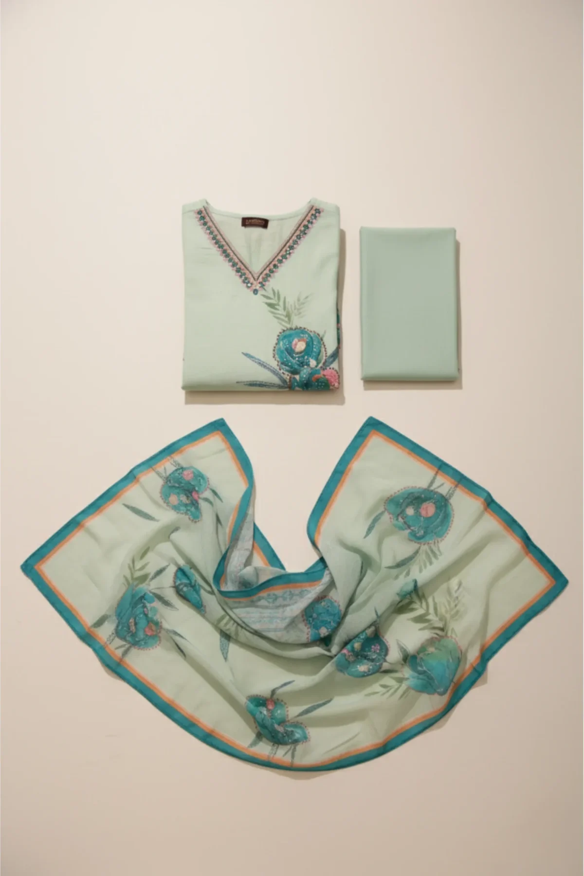 Sky blue khadi suit with intricate hand-painted and highlight work, paired with matching pants and dupatta — ideal for festive and cultural occasions.