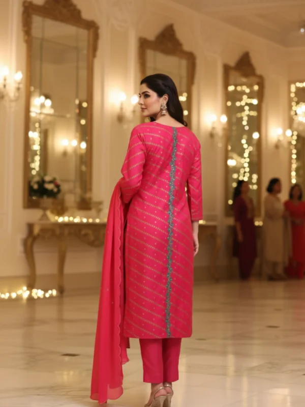Raani pink Model Silk suit with teal contrast and weaving highlight work, styled with matching dupatta and pants — elegant festive ethnic wear for women.
