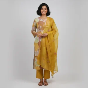 Printed khadi suit with earthy floral motifs, paired with a mustard dupatta and matching pants — perfect for festive daytime elegance.