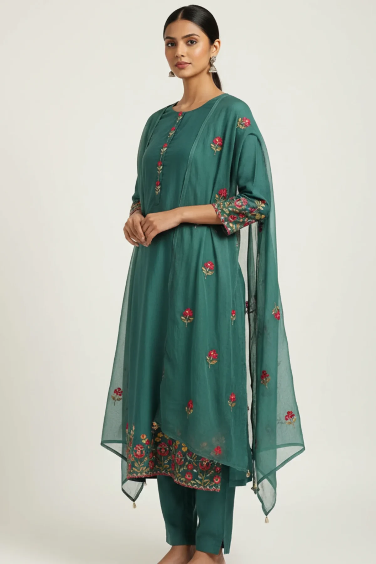 Blue-green Chanderi embroidered suit set with intricate threadwork and matching dupatta — elegant festive wear for women.