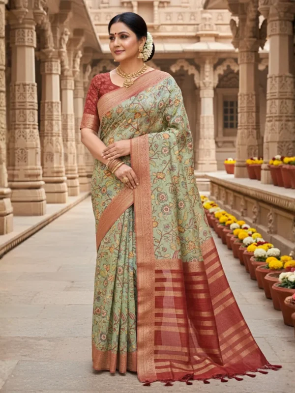 Woman wearing sage green Moonga Tussar saree with Pichwai-inspired print and woven zari border – Rangoli Saris