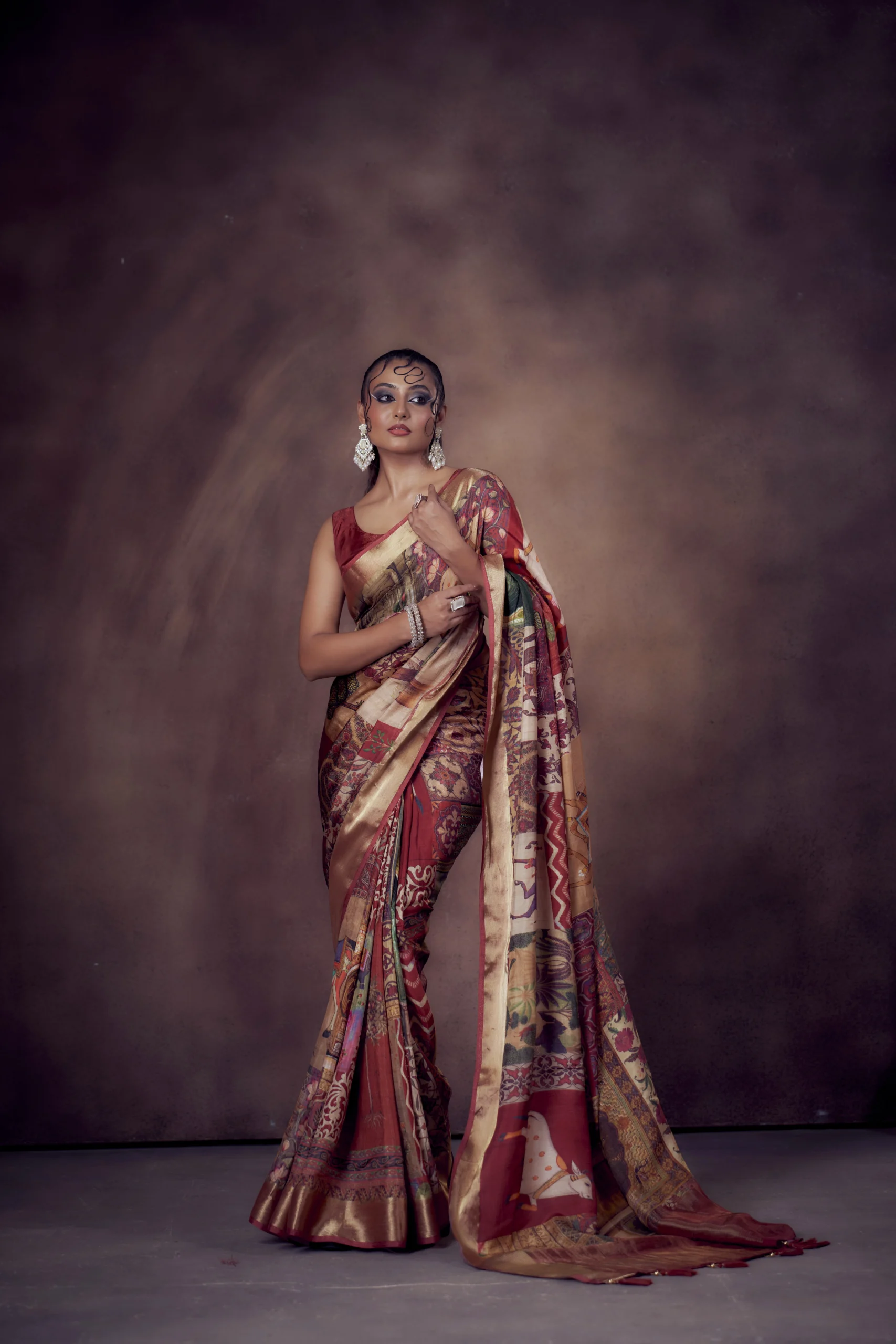 Majestic Maroon Moonga Tussar Saree with Woven Zari Border & Heritage Print Motifs