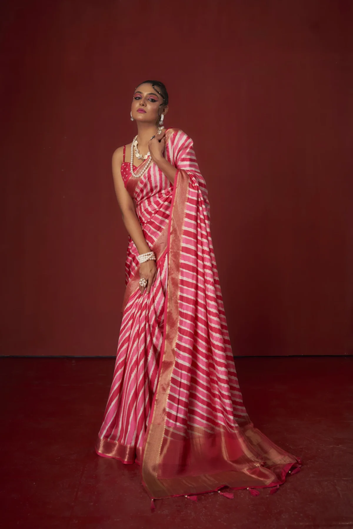 Rani pink Shibori print Moonga Tussar saree with golden woven zari border