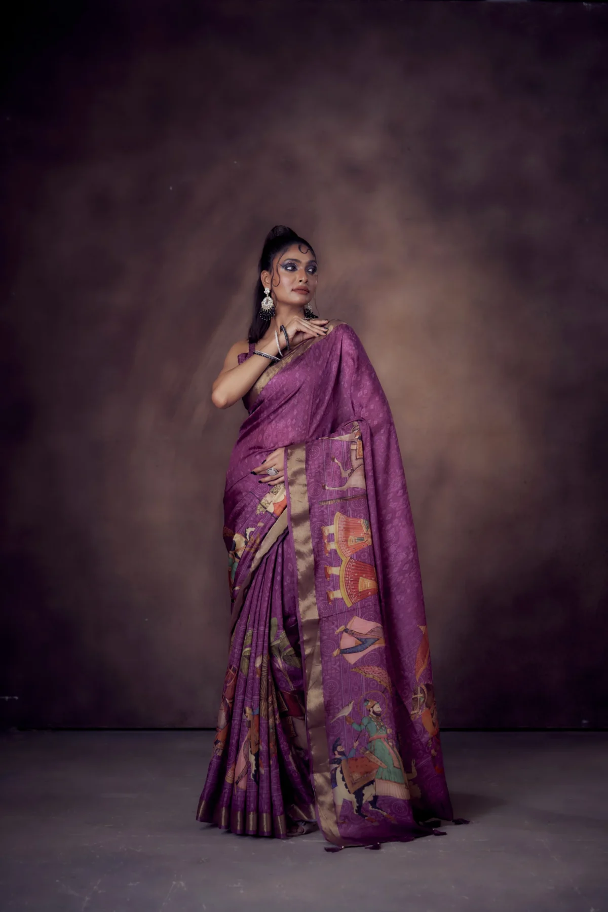 Moonga Tussar saree in plum shade with royal procession print and zari border