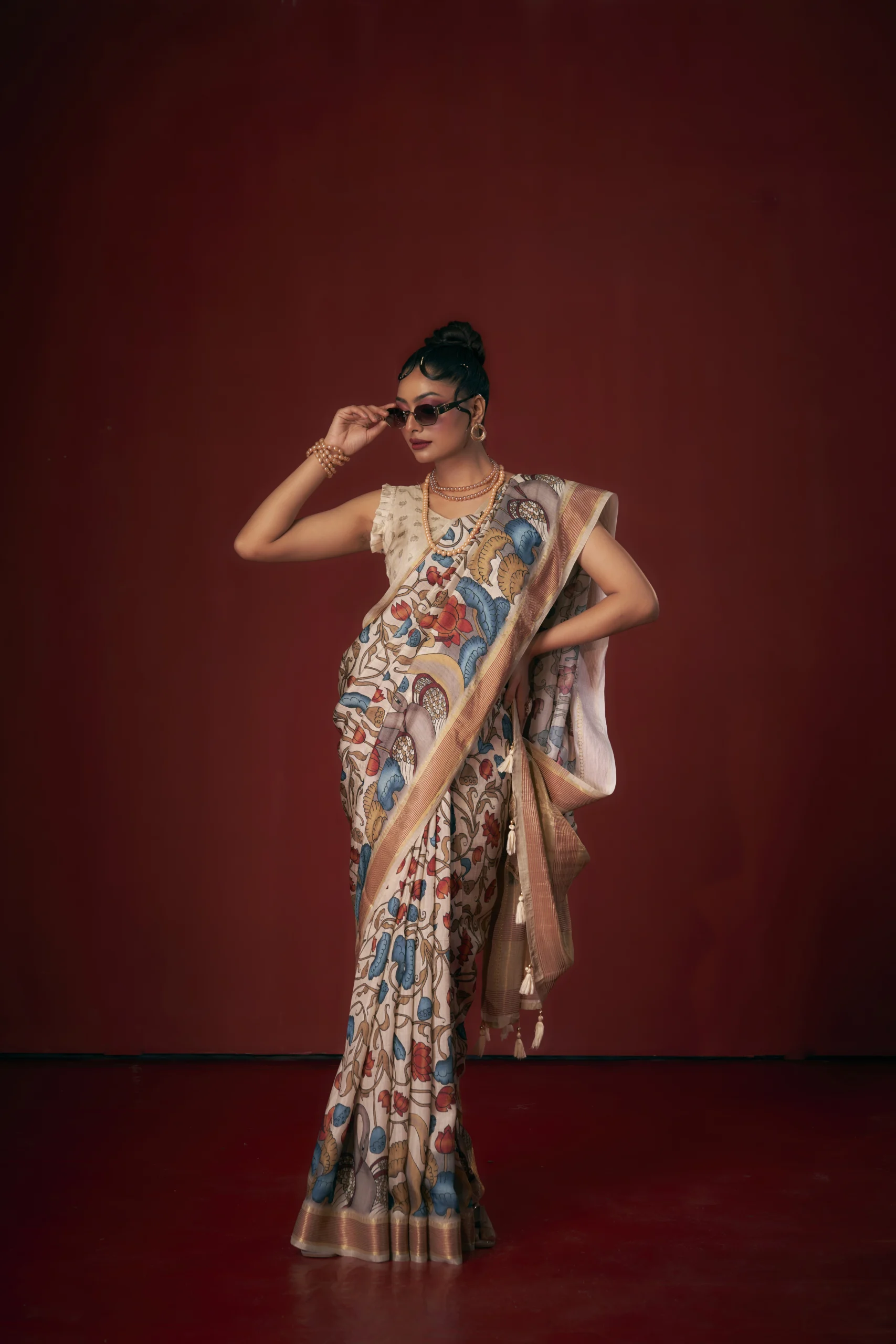 Ivory Moonga Tussar printed saree with traditional heritage motifs and woven jari border