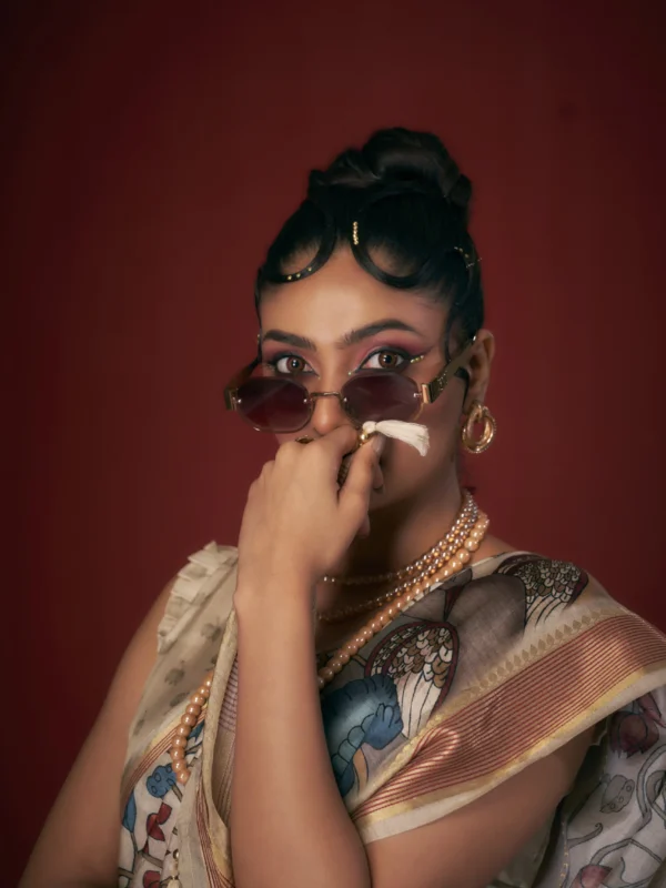 Ivory Moonga Tussar printed saree with traditional heritage motifs and woven jari border