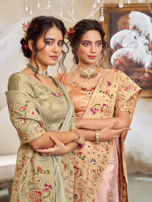 Model wearing a blush caramel hand-embroidered designer saree with ornate detailing and unstitched blouse.