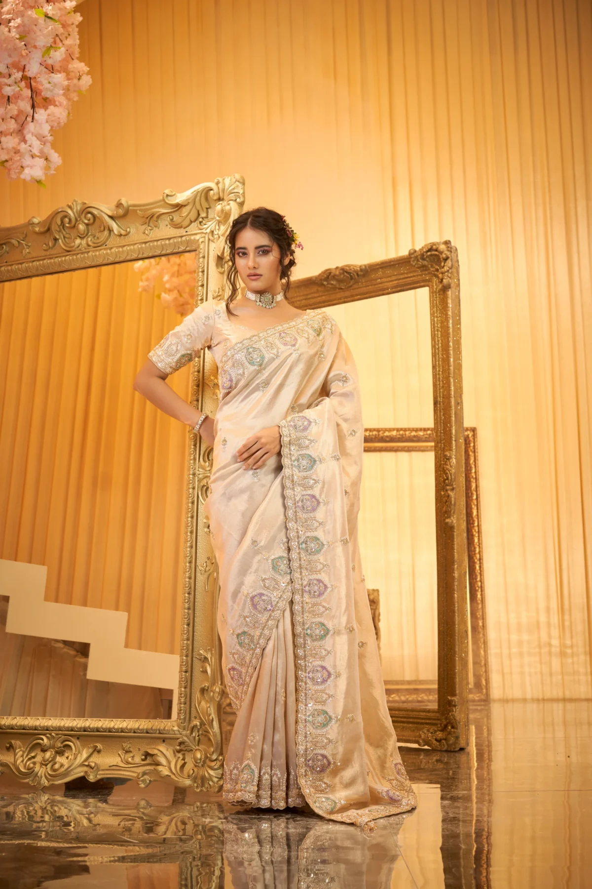 Ivory embroidered silk designer saree with pastel border and unstitched blouse