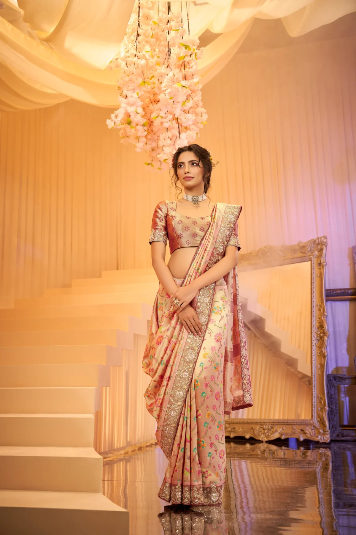 Blush pink designer silk saree with floral weave and sequin zari embroidered border