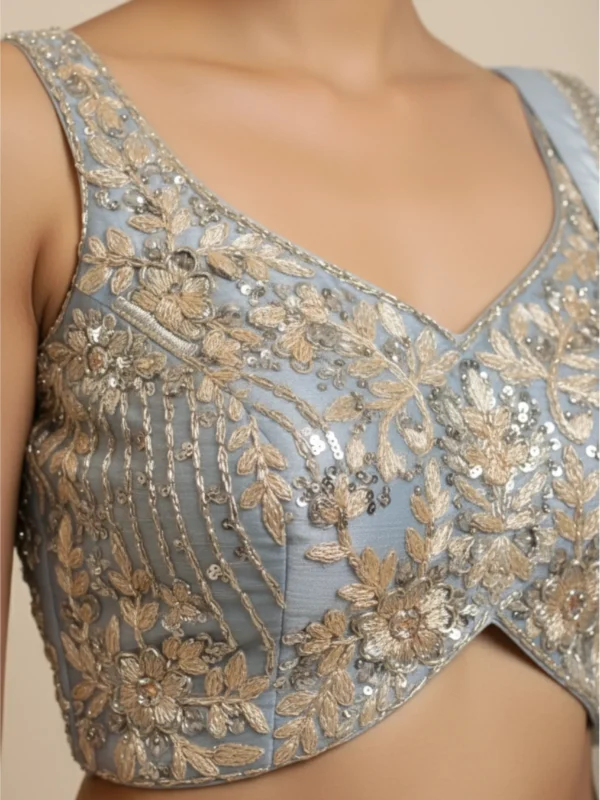 Royal blue net designer lehenga with bead and crystal embellished blouse and dupatta