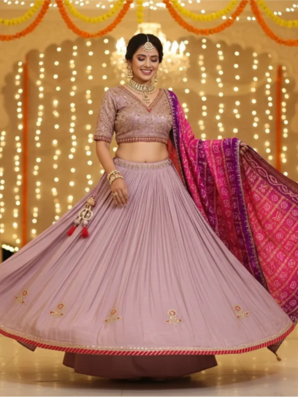 Royal blue net designer lehenga with bead and crystal embellishments and matching dupatta