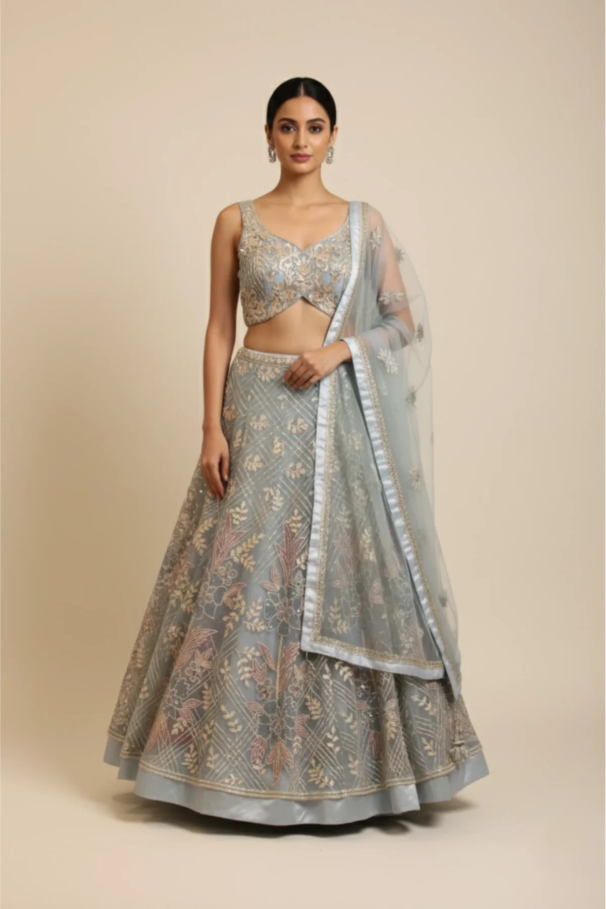 Royal blue net designer lehenga with bead and crystal embellished blouse and dupatta
