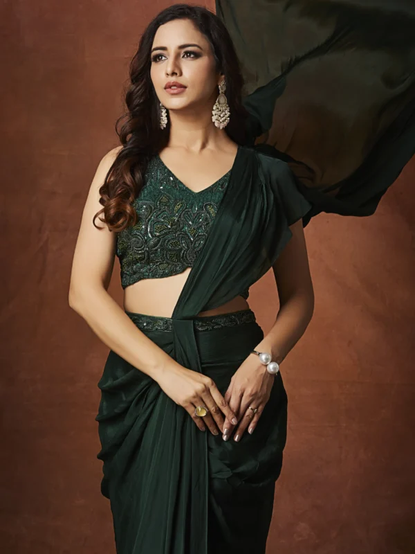 Emerald green designer draped saree with embellished blouse for cocktail wear