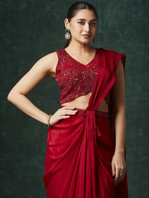 Crimson red designer draped saree with embroidered blouse for cocktail wear