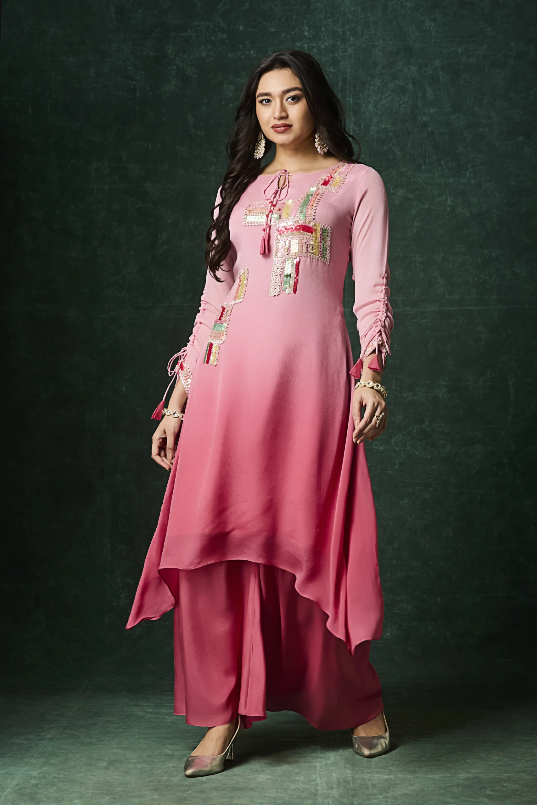 Blush pink embroidered Indo Western palazzo set with asymmetrical kurta and festive thread work detailing for women