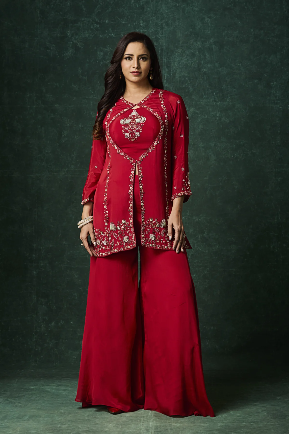 Crimson red embroidered jacket-style Indo-Western outfit for festive occasions