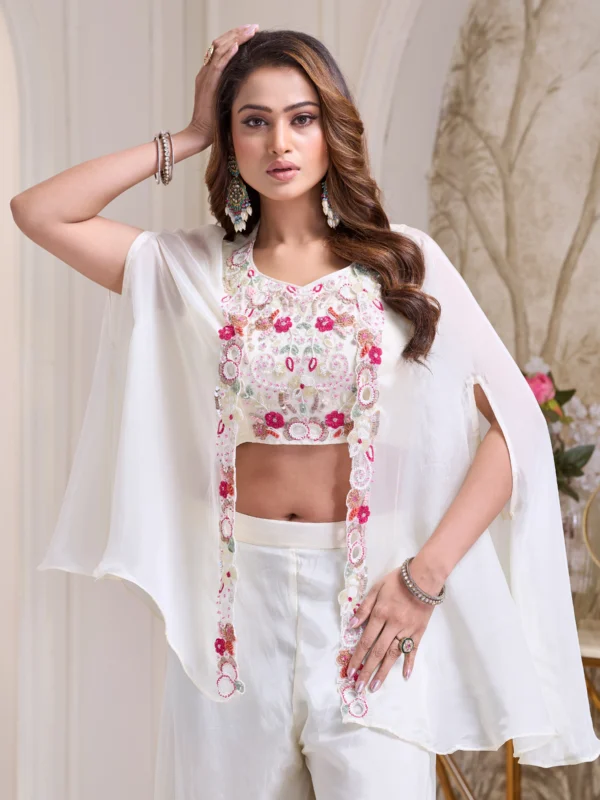 Ivory Indo Western cape set with floral embroidered blouse and wide leg palazzo pants for festive and wedding wear.