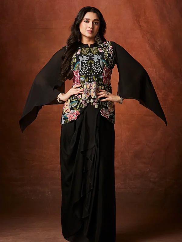Black Indo Western drape set with multicolour floral embroidered bodice and cape sleeves for reception and cocktail wear.