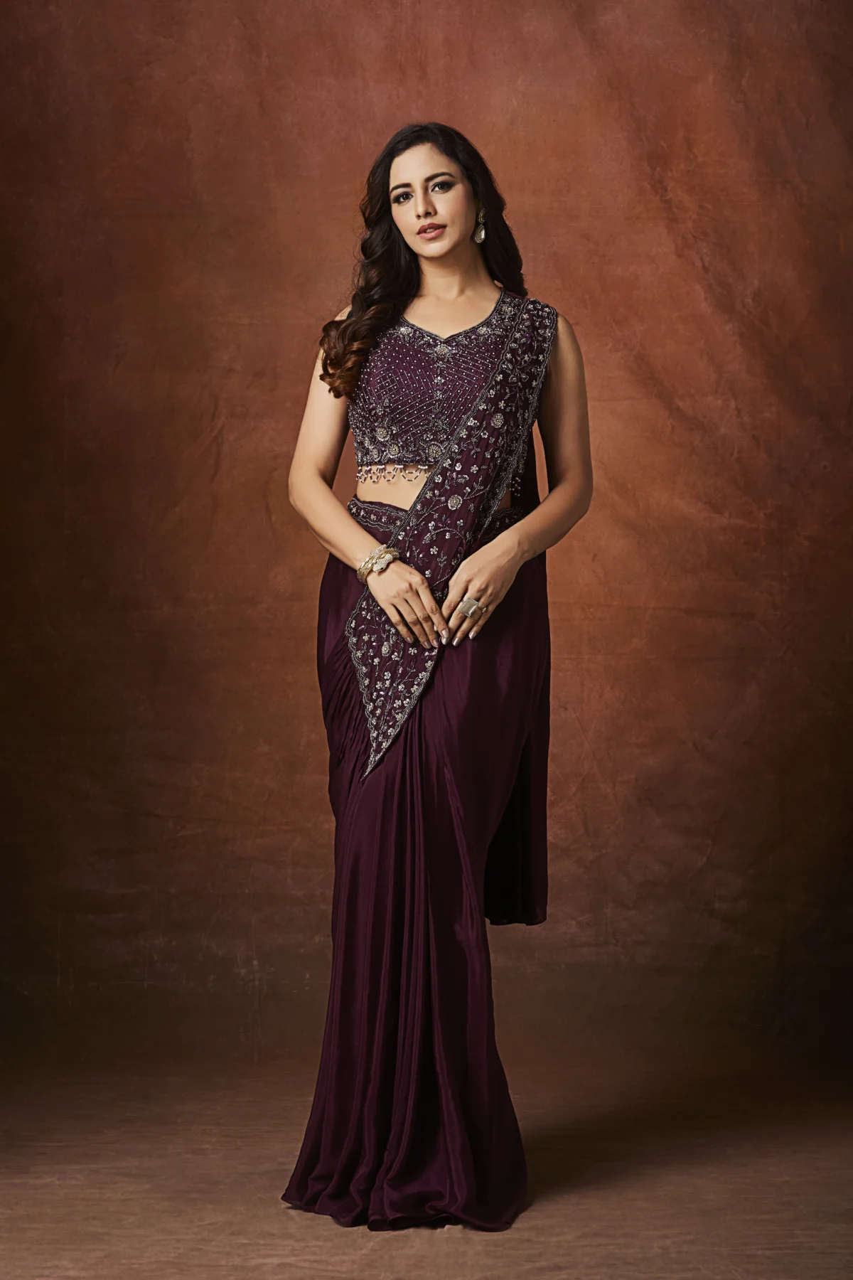 Wine embroidered draped saree with designer blouse for wedding and party wear
