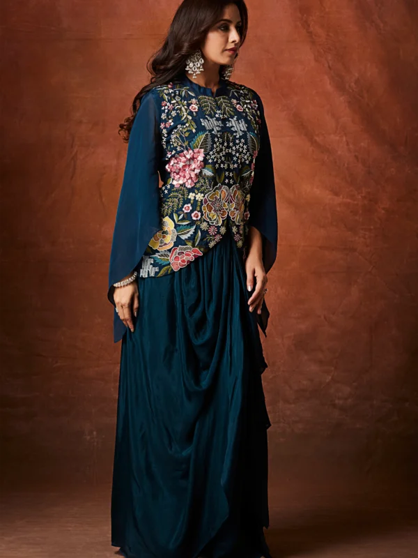 Midnight teal Indo Western drape set with floral embroidered bodice and cape sleeves for wedding and festive wear.