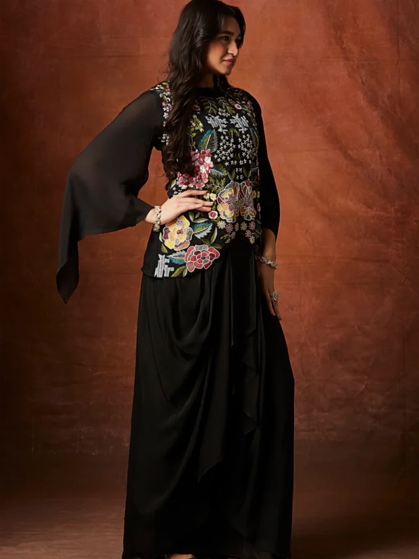 Black Indo Western drape set with multicolour floral embroidered bodice and cape sleeves for reception and cocktail wear.