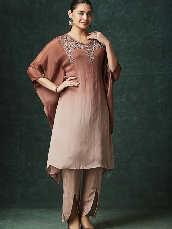 Mocha brown Indo Western cape kurta set with embroidered neckline and straight slit pants for festive wear.
