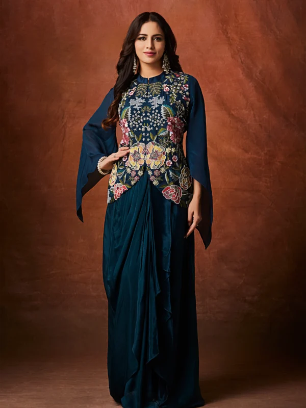 Midnight teal Indo Western drape set with floral embroidered bodice and cape sleeves for wedding and festive wear.