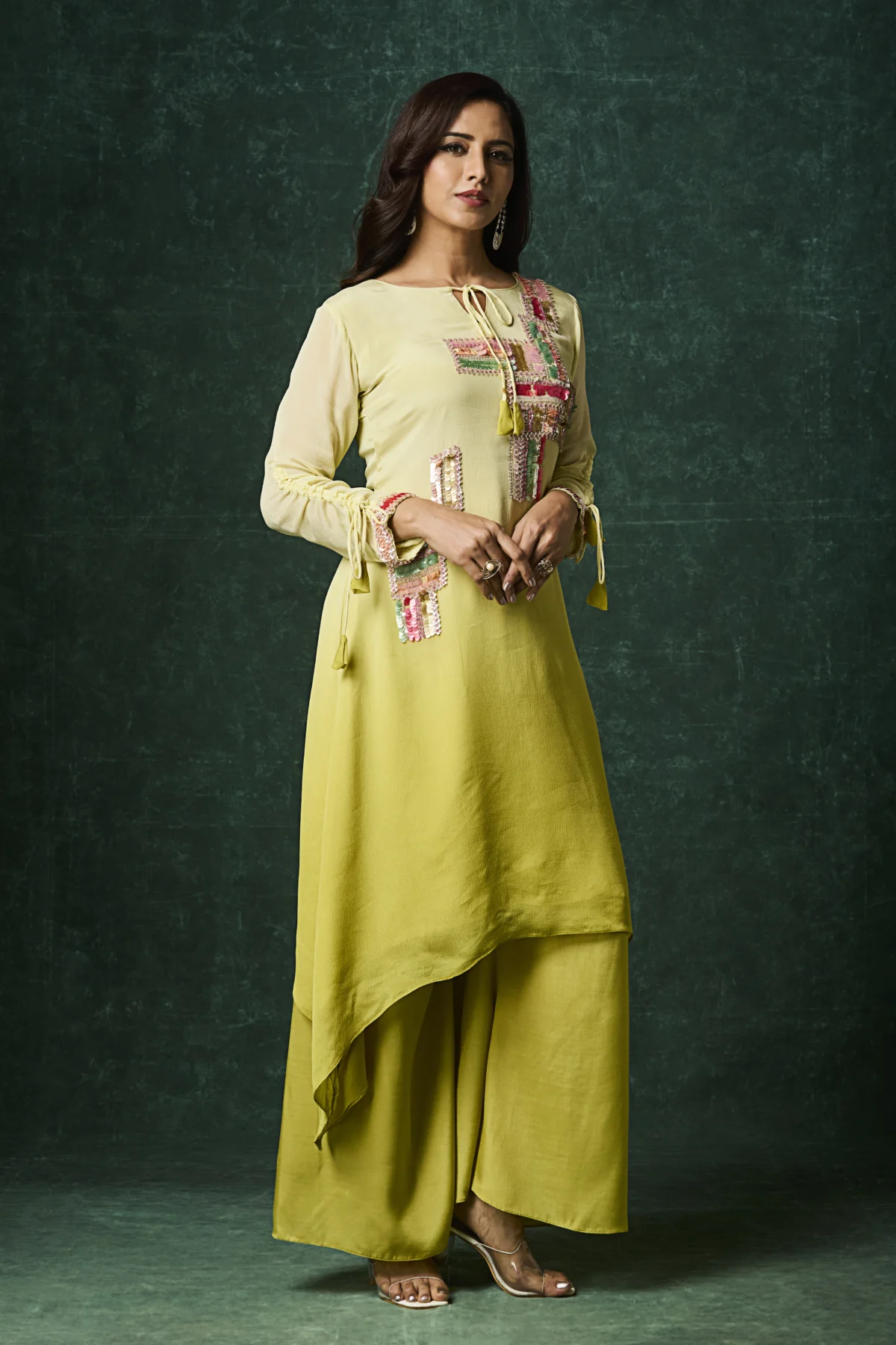 Citrine yellow embroidered Indo Western palazzo set with asymmetrical kurta and multicolor festive thread work for women