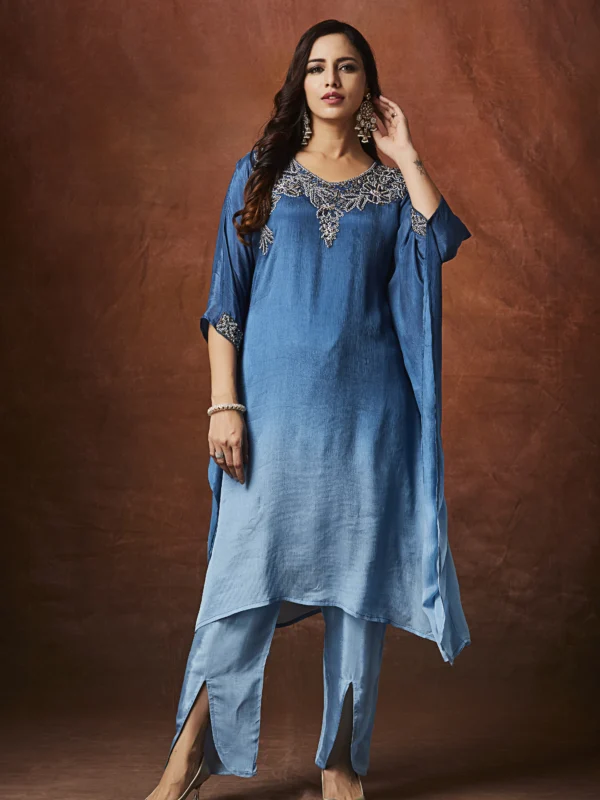 Azure blue Indo Western cape kurta set with silver embroidered neckline and straight pants for festive wear.