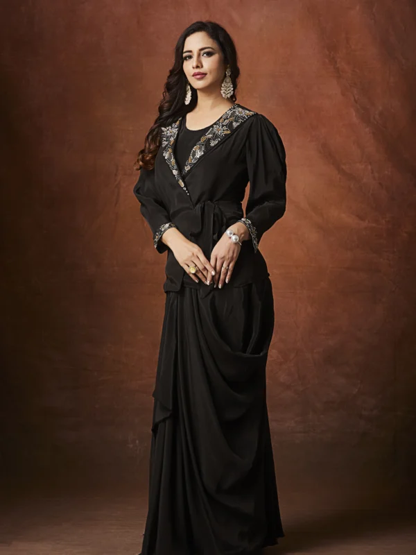 Black embellished Indo Western draped outfit with wrap blouse and long flowing skirt for evening wear.