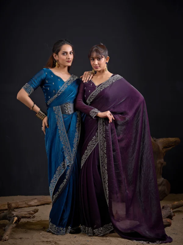 Luxury crush shimmer georgette designer saree with Swarovski stone embellished border and unstitched blouse piece, perfect for wedding, festive and party wear.