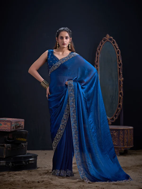 Noor Swarovski Crush Shimmer Georgette Designer Saree with Swarovski Stone Border and Unstitched Blouse in Teal Blue, Navy Blue, Mehroon, Cherry Pink, Black and Purple.