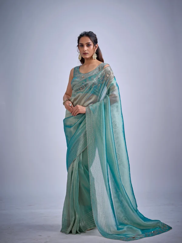 Celeste Swarovski Crush Tissue Georgette Designer Saree with Swarovski Stone Work and Unstitched Designer Blouse available in Rose Pink, Copper, Ice Blue and Golden.