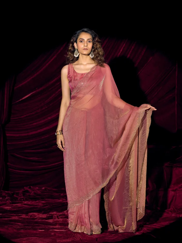 Rose Pink Meher Swarovski Shimmer Georgette Designer Saree with Hand Embellished Swarovski Border and Unstitched Designer Blouse.