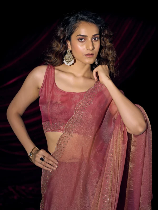 Rose Pink Meher Swarovski Shimmer Georgette Designer Saree with Hand Embellished Swarovski Border and Unstitched Designer Blouse.