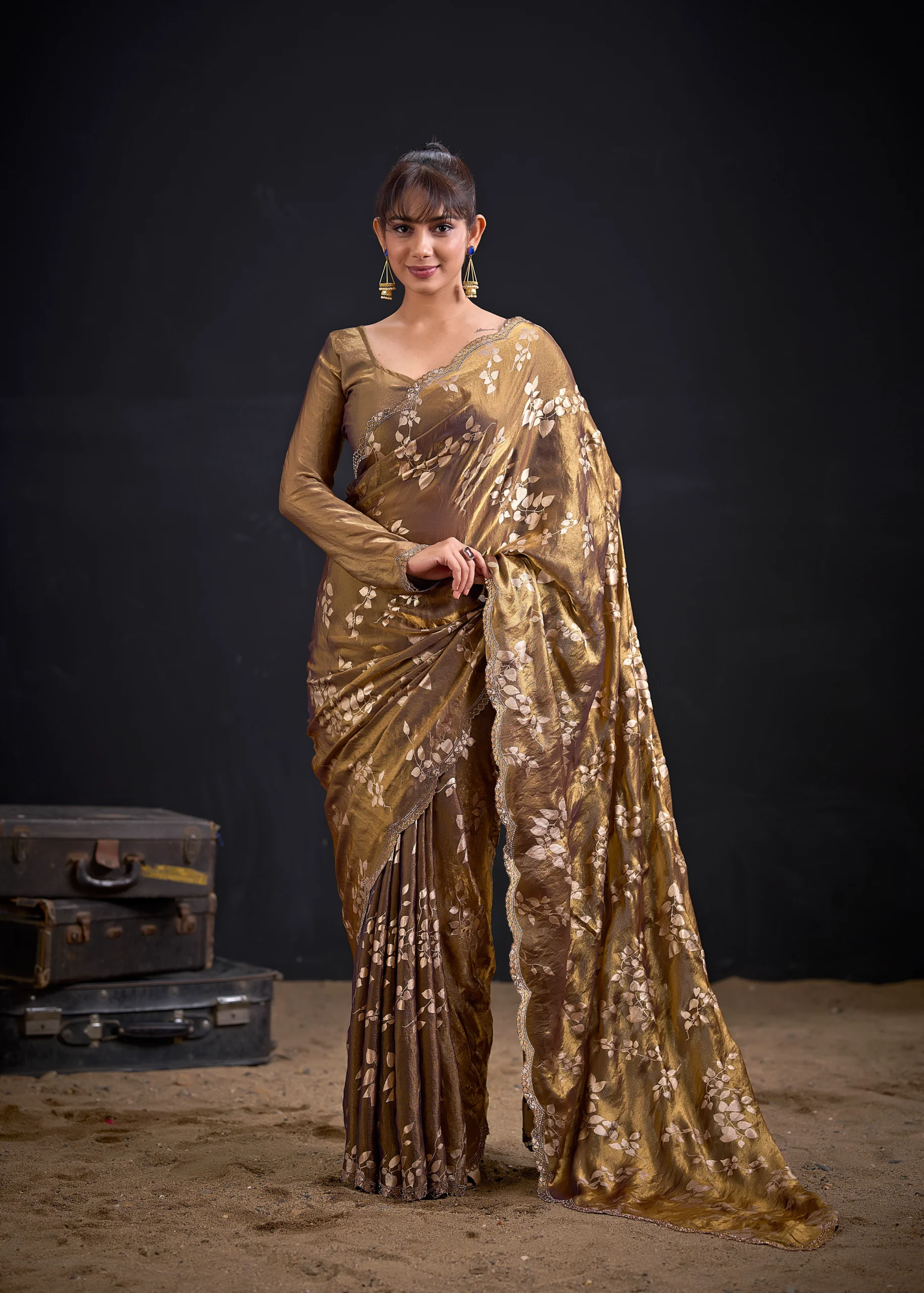 Noorva Shimmer Georgette Foil Print Saree with Swarovski embellished border and matching unstitched blouse.