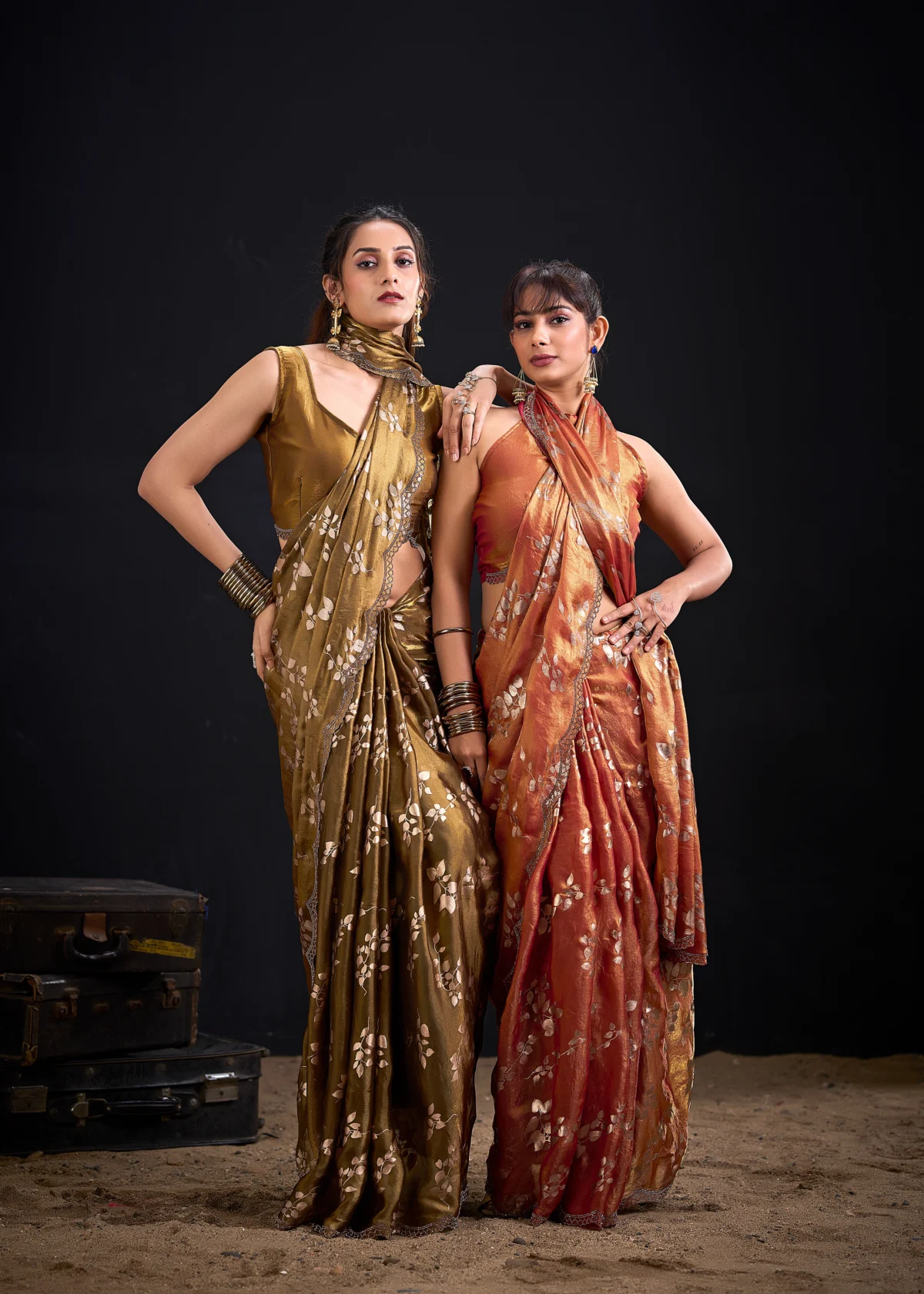 Noorva Shimmer Georgette Foil Print Saree with Swarovski embellished border and matching unstitched blouse.