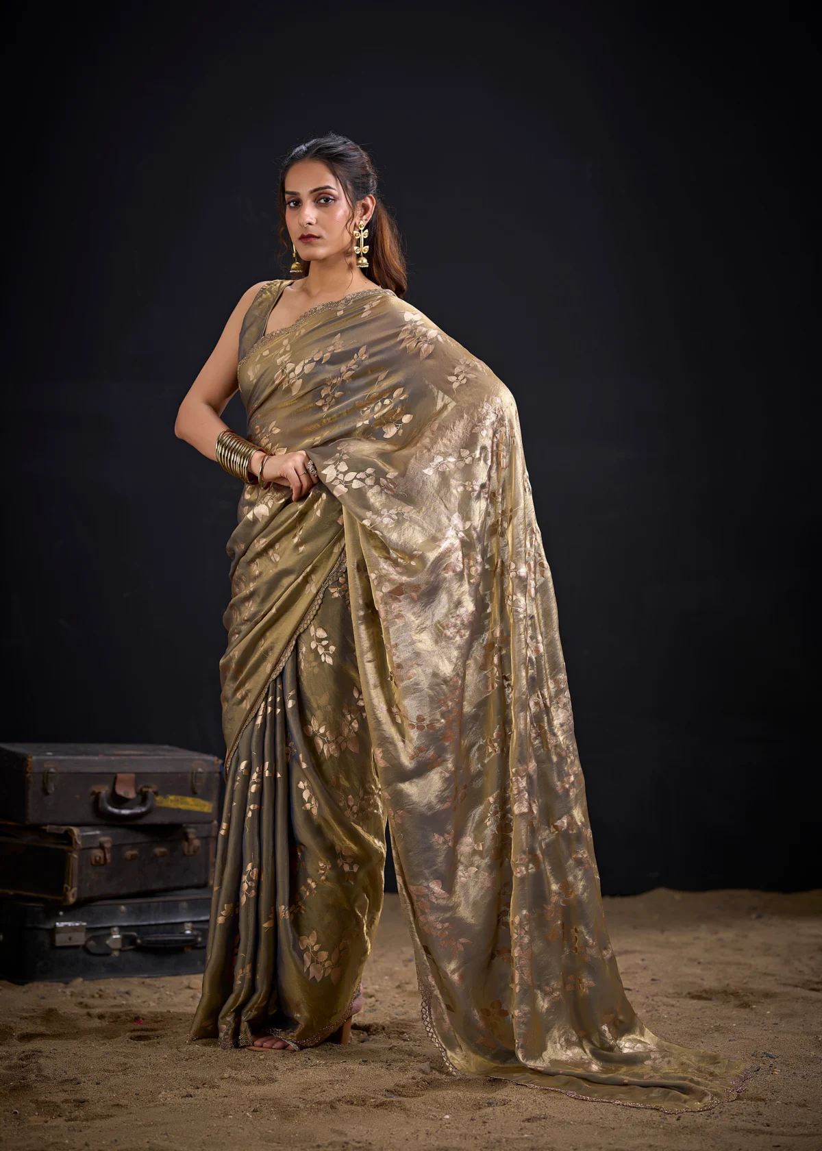 Noorva Shimmer Georgette Foil Print Saree with Swarovski embellished border and matching unstitched blouse.