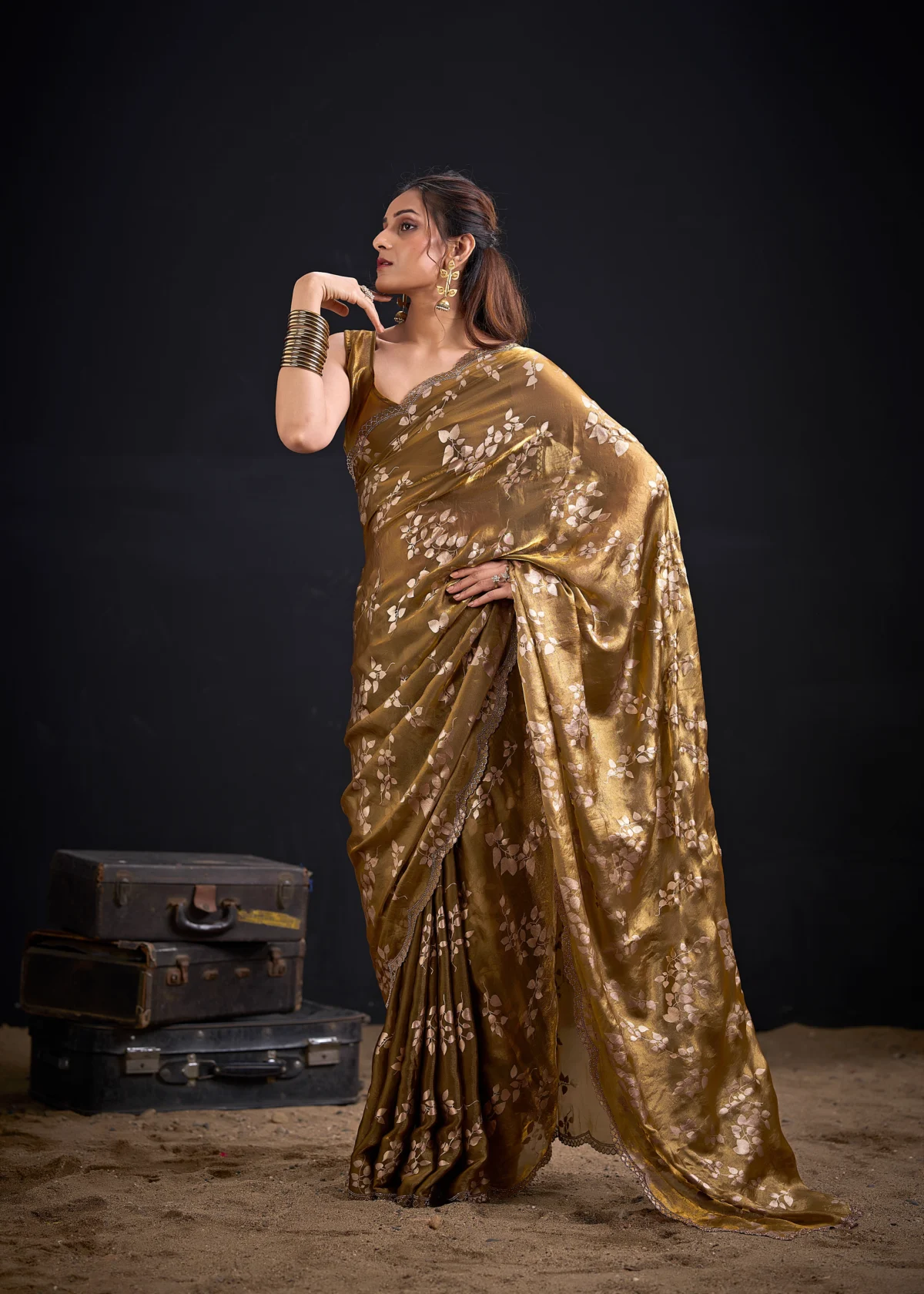 Noorva Shimmer Georgette Foil Print Saree with Swarovski embellished border and matching unstitched blouse.