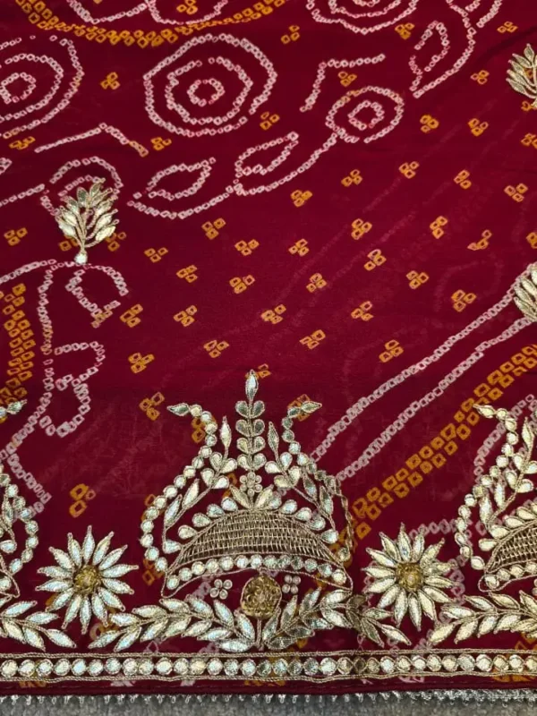 Pure Ojariya Hand Bandhej Chunri Saree with Heavy Rajwadi Gota Patti Work in maroon, traditional Rajasthani festive saree with matching blouse piece, ideal for Teej, Raksha Bandhan, Karwa Chauth and wedding celebrations.