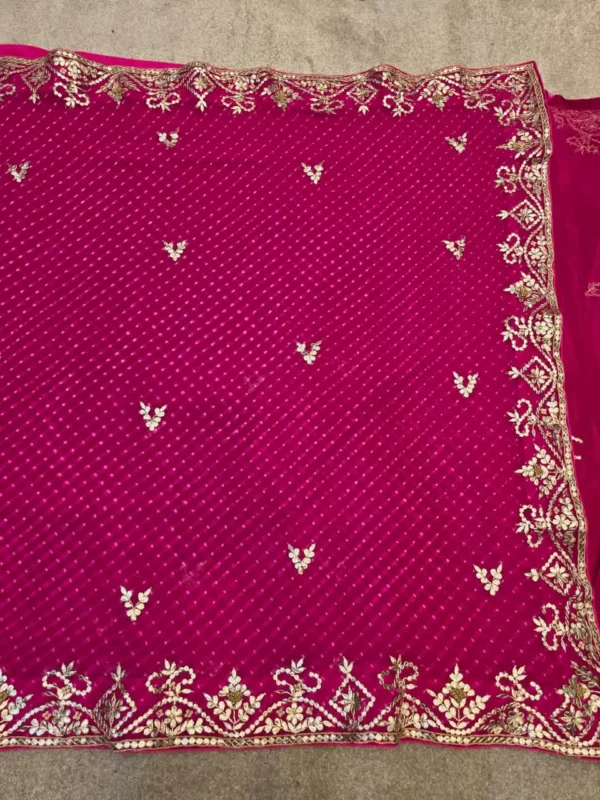 Rajkumari Gulposh Rani Pink Pure Georgette Lehariya Saree with handcrafted Silver Gota Patti embroidered floral border.