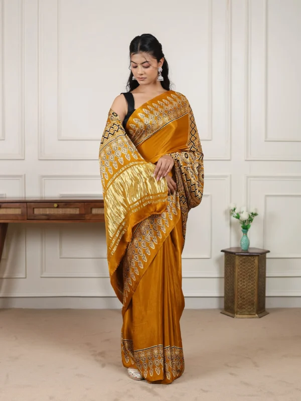 Heritage Ajrakh satin silk saree with traditional Ajrakh print and solid zari pallu featuring matching unstitched blouse